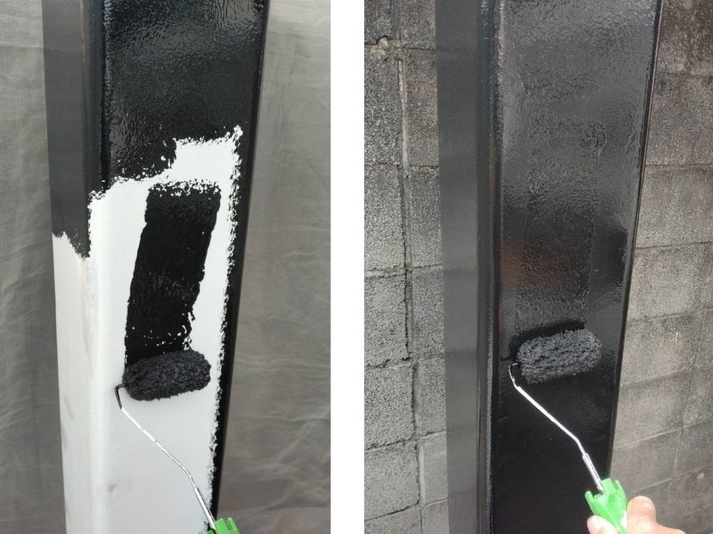 鉄骨柱の補修工事で、さび止め後に仕上げ塗装を行っている様子